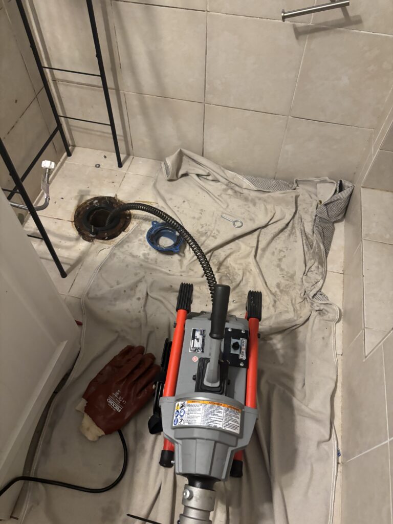 Licensed master plumber performing drain cleaning in Laurel MD | Twin Plumbing Solutions