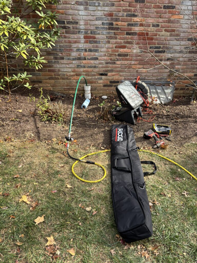 Trenchless repair protects landscaping and driveways from excavation