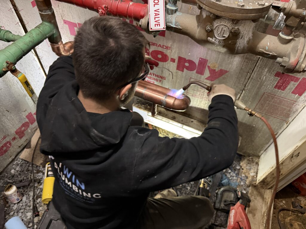 Licensed commercial plumber performing commercial plumbing maintenance and repairs in Laurel MD | Twin Plumbing Solutions